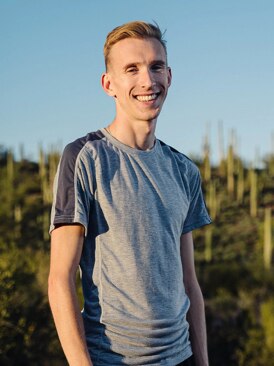Adam Dalton smiling on a sunny day
