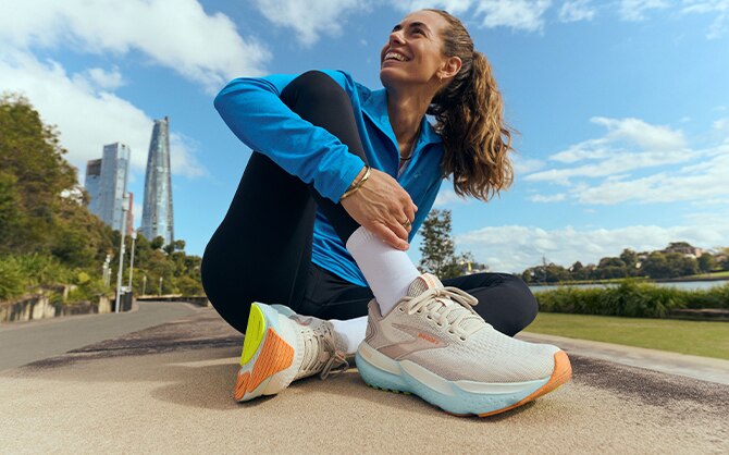 Lifestyle image of a woman wearing Glycerin 21s
