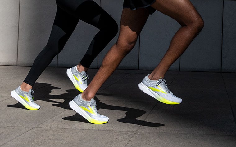 Close-up of two runners’ legs in the Hyperion Elite.