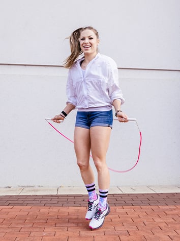 Woman skipping with rope