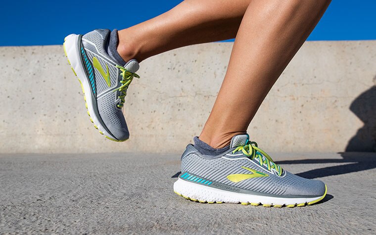 Close-up of a runner’s feet in the Adrenaline GTS, mid-stride.