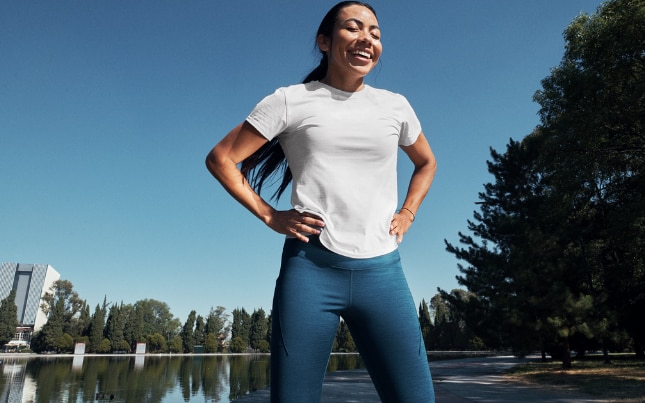woman smiling while working out