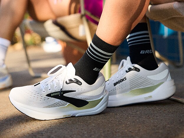 Medium shot of two Brooks models wearing the new Ghost MAX running shoes 
