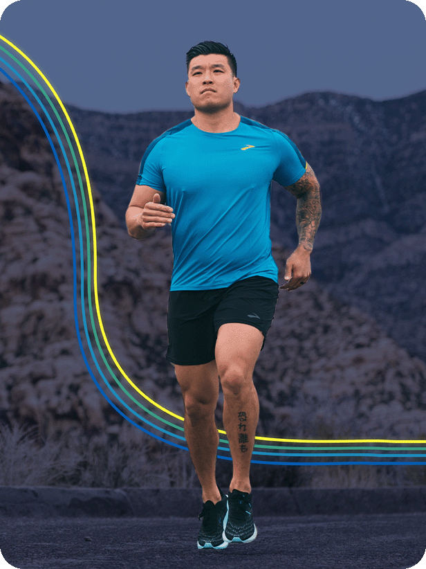 Front view of runner on dark background