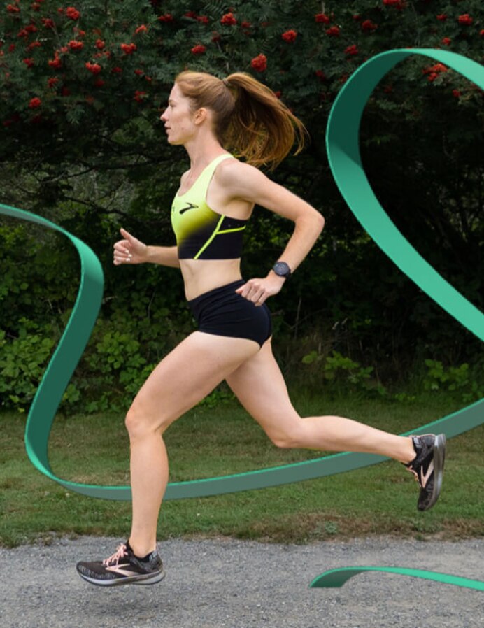 A runner outside with a green ribbon