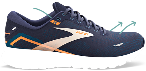 Running shoe with green arrows 