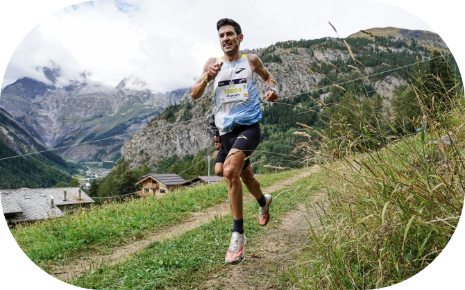 Long shot of a Brooks athlete running on a mountain