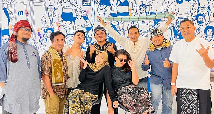 A group of people smile for a photo