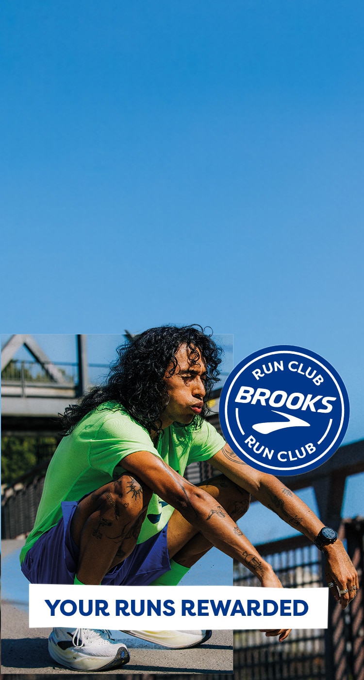 Medium shot of two runners wearing Brooks gear