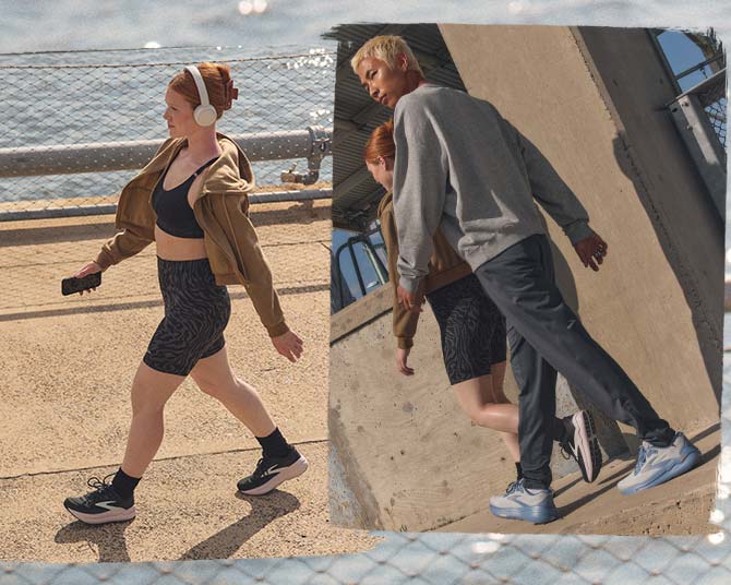 A woman and a man walking across a sidewalk