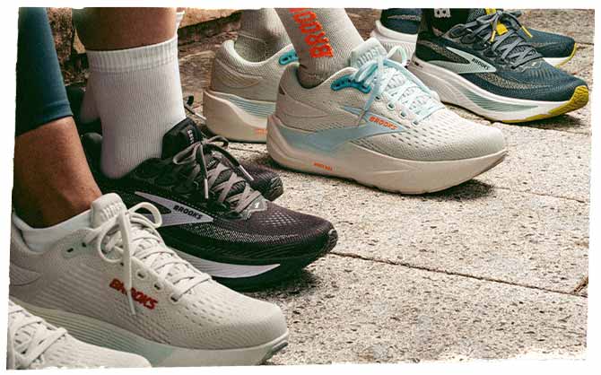 Pairs of different Brooks Ghost shoes lined up next to each other