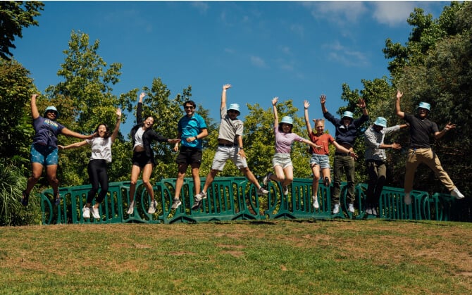 Group of Brooks employees holding a sign saying "Global Running Day"