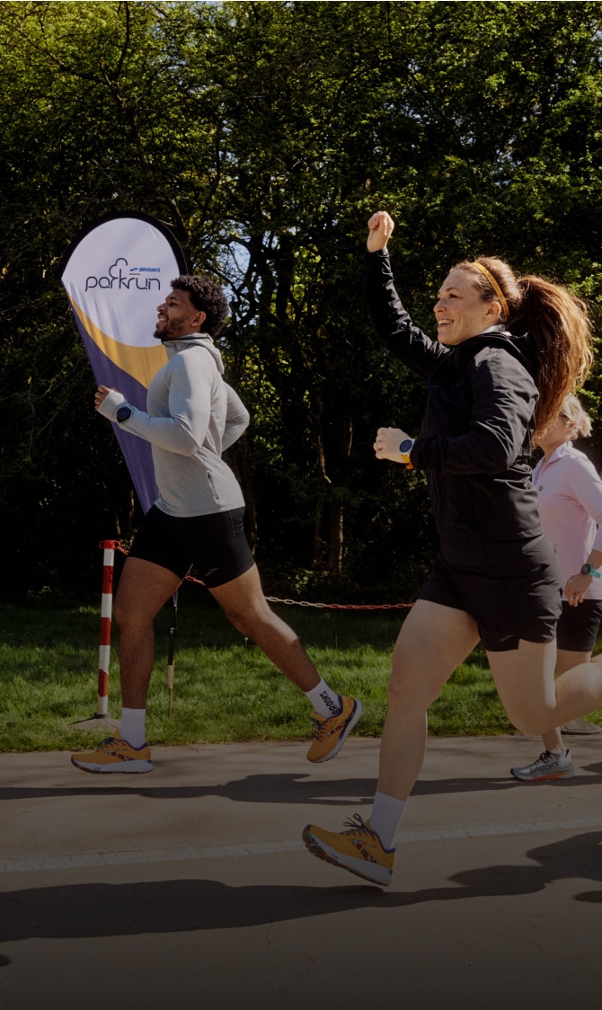 Medium shot of a group of runners wearing Brooks gear