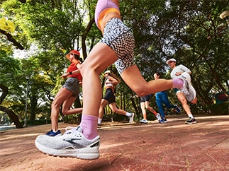 Medium shot of women running in the park