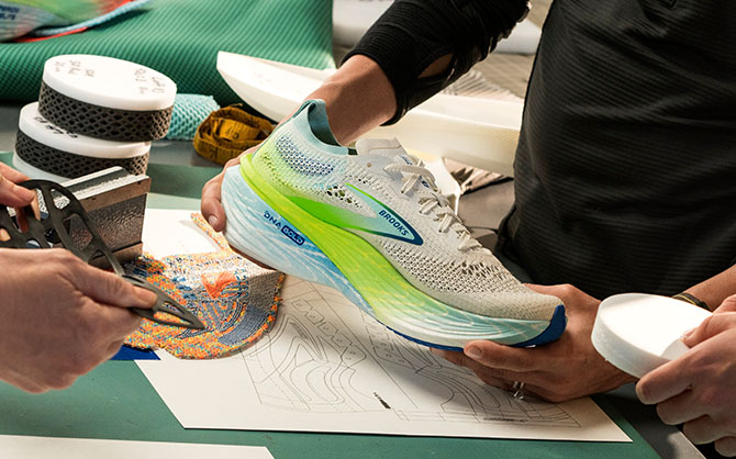 A shoe being held and examined