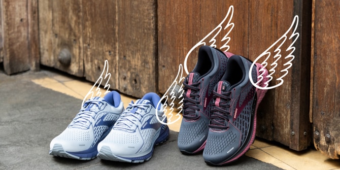 Two pairs of Brooks Adrenaline GTS 21 shoes with wing illustraions on the backs of the shoes