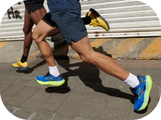 Medium shot of two men wearing Brooks Running shoes