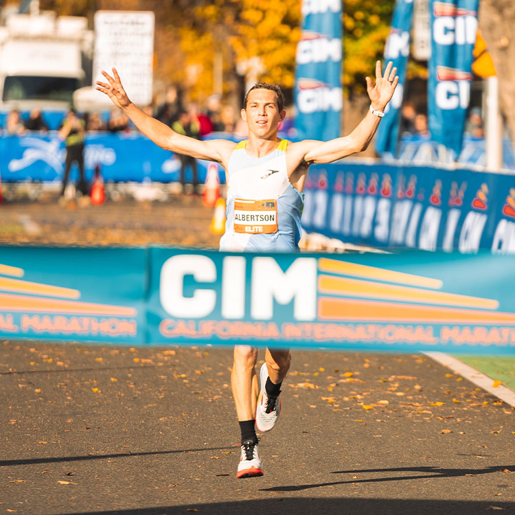 CJ Albertson crossing the finish line