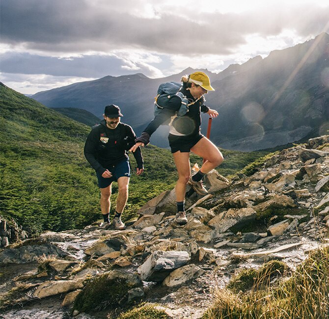 Two runners on a mountain