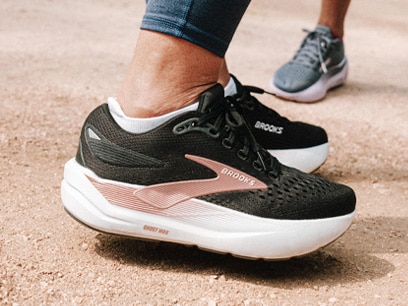 A person wearing Brooks shoes