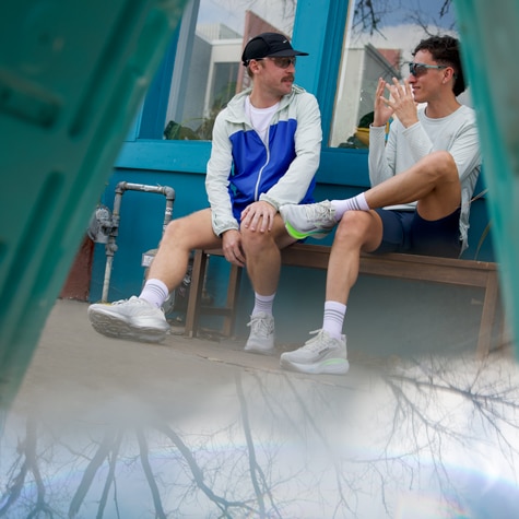 Blurry image of two people running