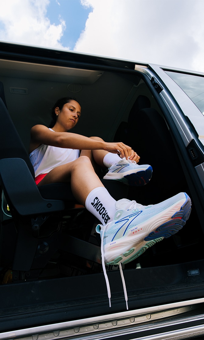 Woman wearing the latest trail shoes and clothing from Brooks