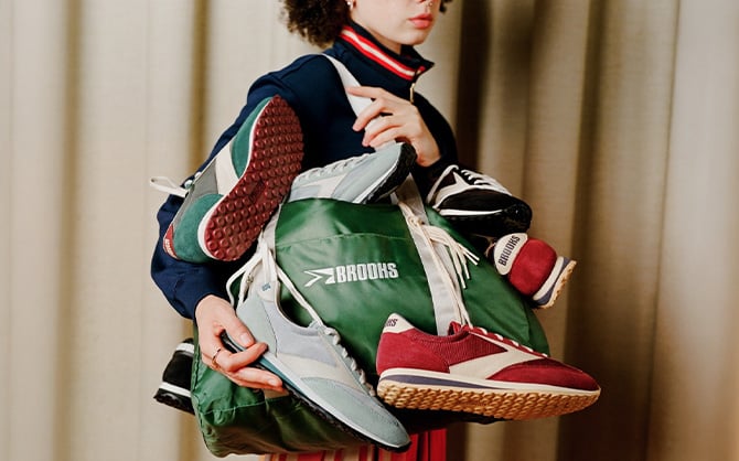 A woman holds the Brooks Vanguard