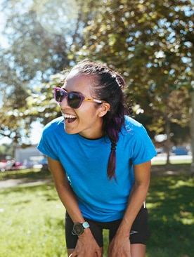 Women with blue shirt on a sunny day