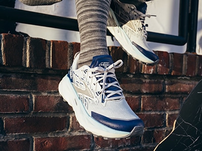 A person wearing Brooks lifestyle shoes.