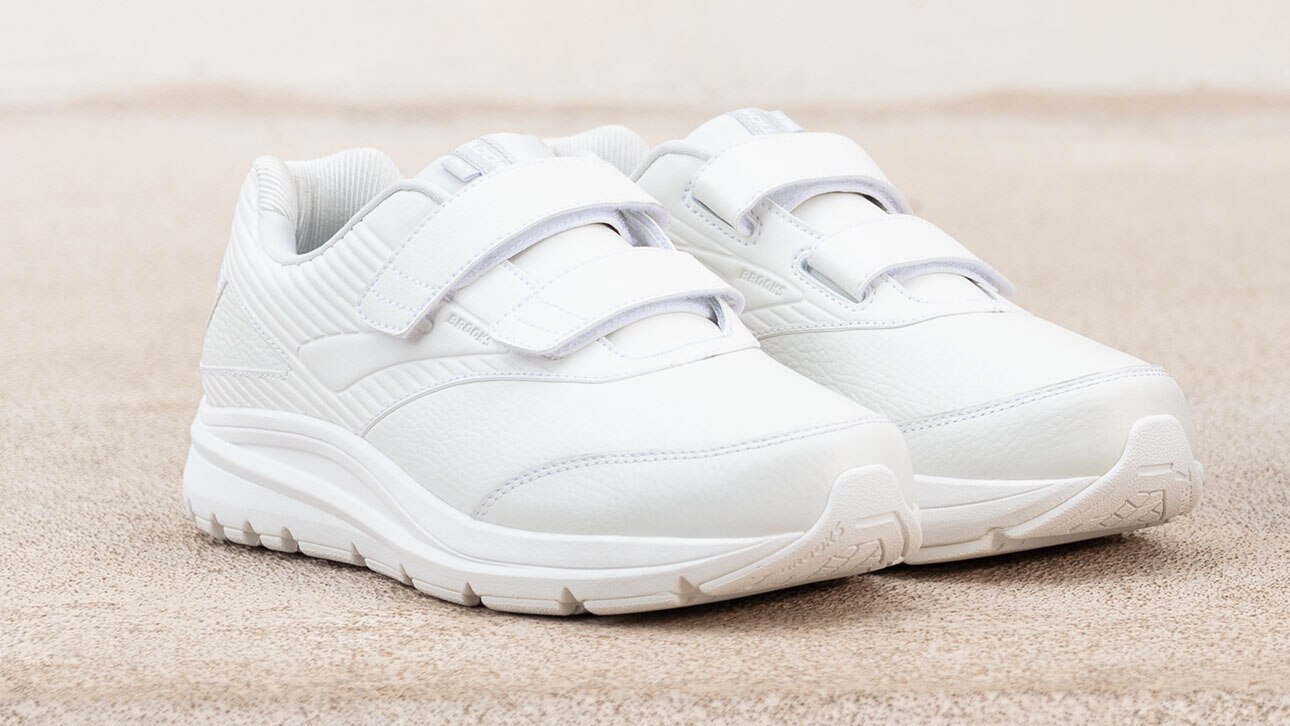 A close-up on a pair of the Addiction Walker 2 V-strap in white