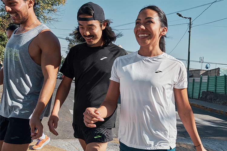 A group of runners wearing Brooks
