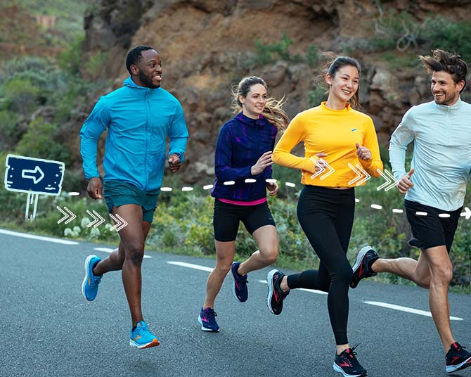 Four people running on road
