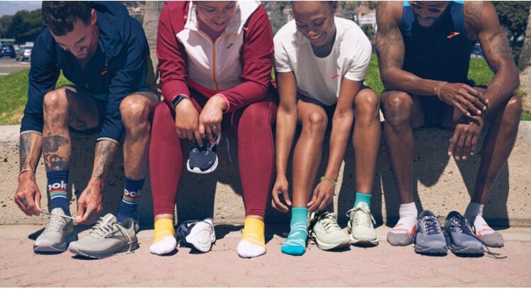 Runners wearing Brooks apparel and shoes