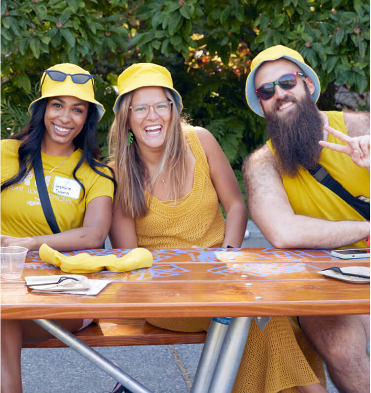 Brooks employees dressed in yellow