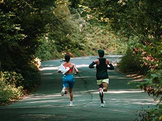 Two runners looking off into the horizon