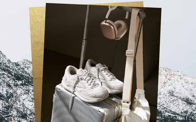 Une paire de chaussures Brooks sur une valise