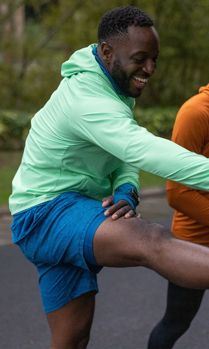 Model with Sherpa shorts running