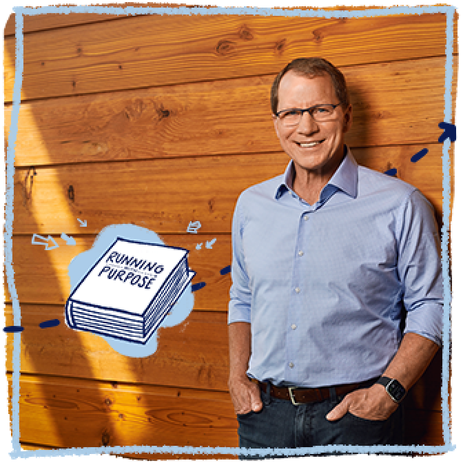 Brooks-CEO Jim Weber lehnt an einer Holzwand mit der Illustration seines Buches