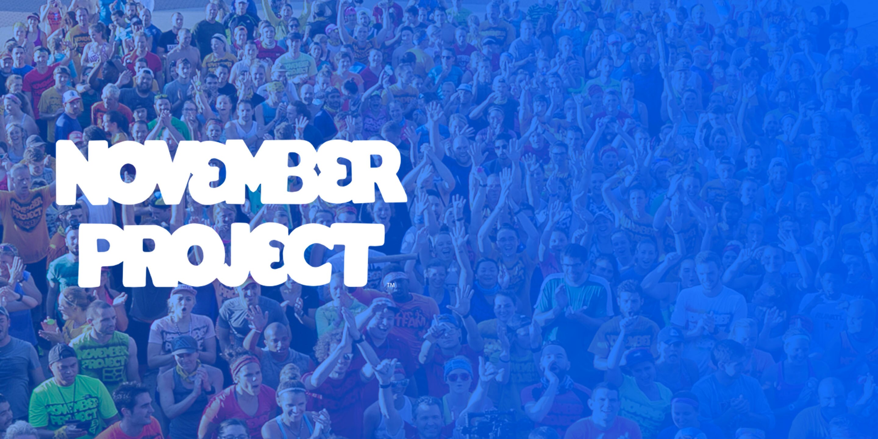 Text that reads 'November Project' over a picture of a crowd