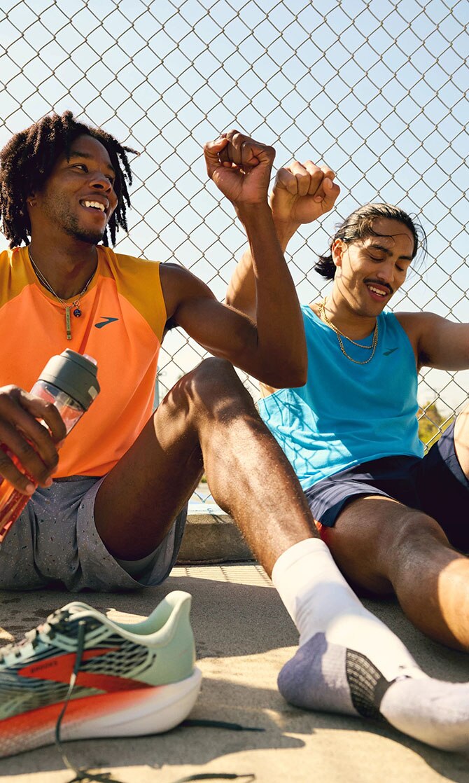 Two runners wearing Brooks running gear