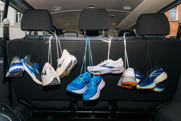 shoes hanging one a car