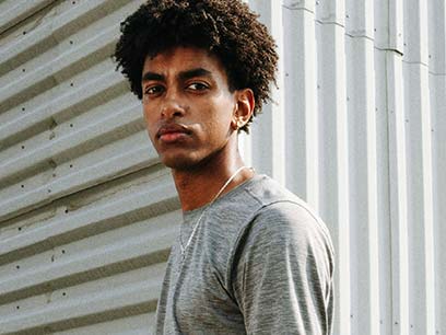 Man wearing a gray shirt