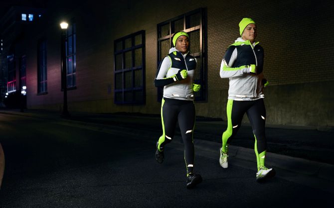 Runners wearing bright clothing in the dark