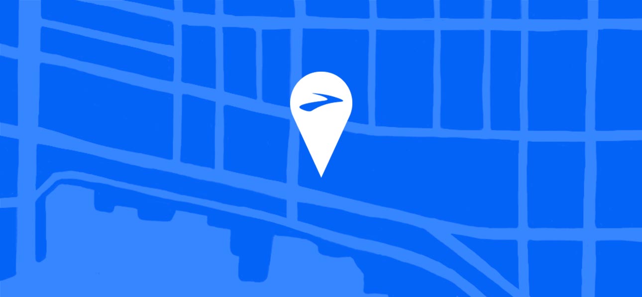 Blue illustrated map of downtown Fremont with an arrow in the middle and the Brooks Running path logo inside.  