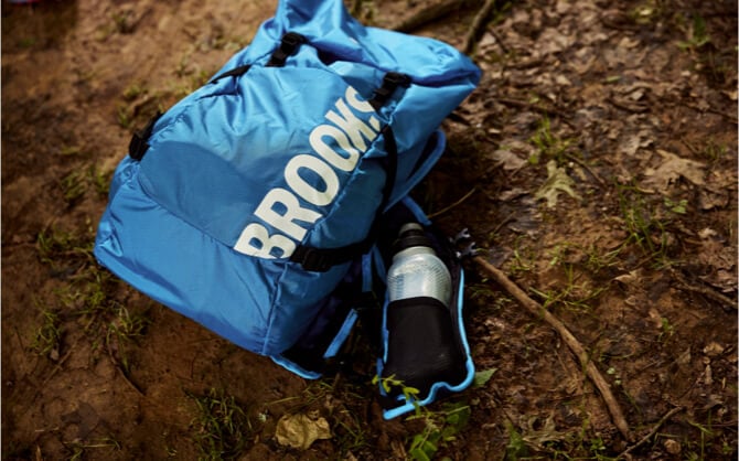 Brooks blue stride pack on ground