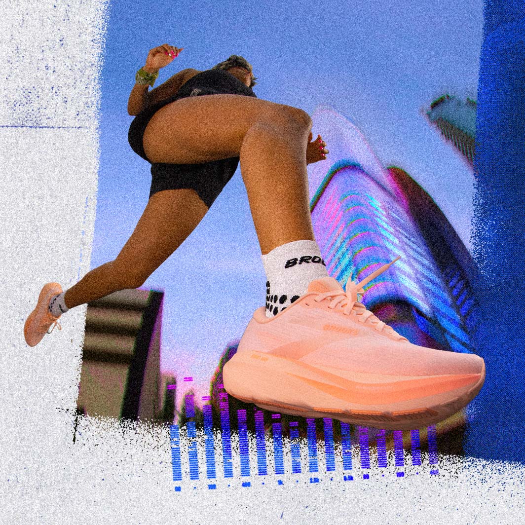 A woman running in the Ghost Amp against a city background