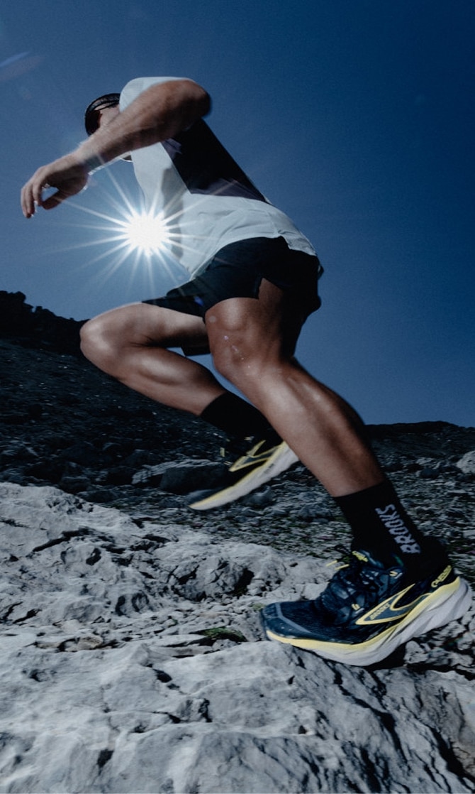 Man wearing the latest trail shoes and clothing from Brooks