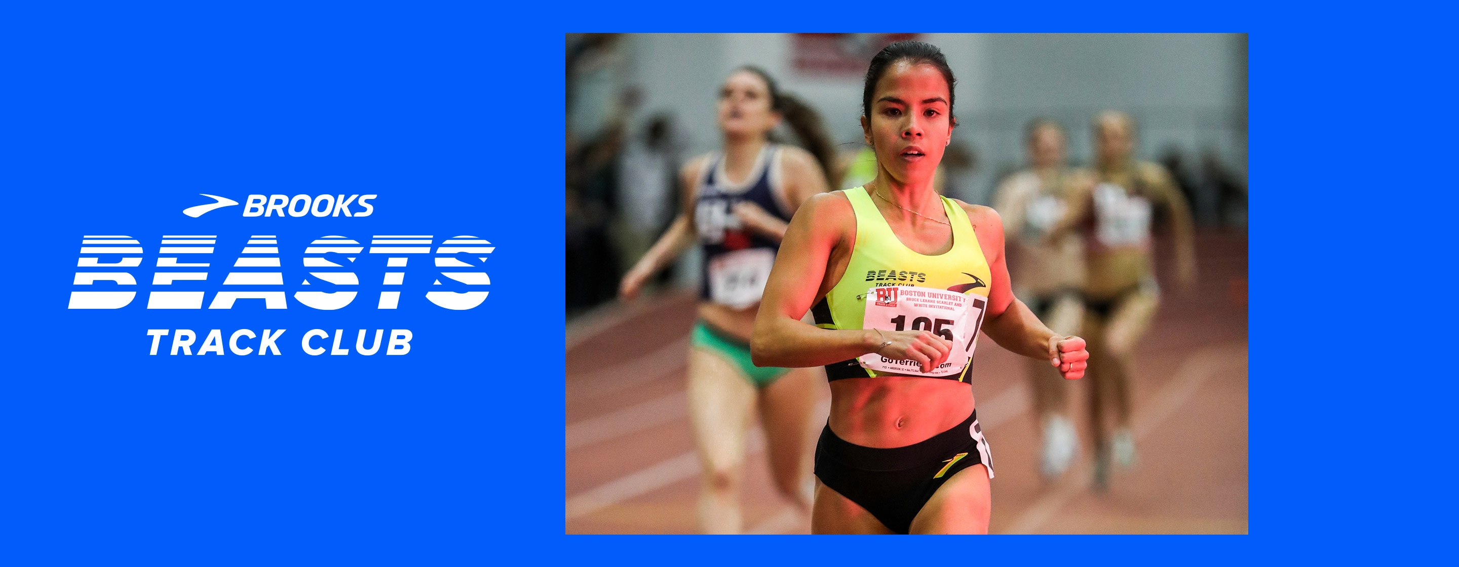 Brooks pro runner Marta Pen Freitas Pires runs hard to the finish line at an indoor track meet.