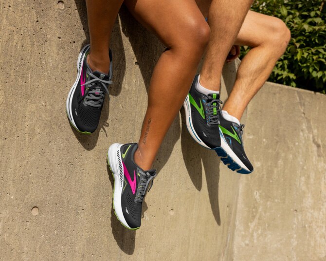 Two models wearing the women and men's Adrenaline GTS 23