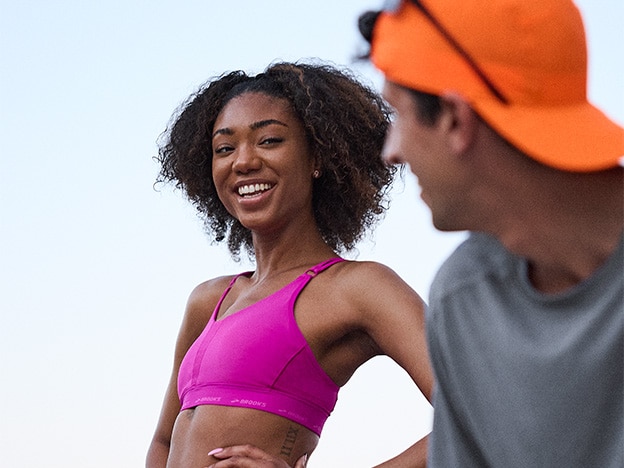 Medium shot of models wearing Brooks running gear